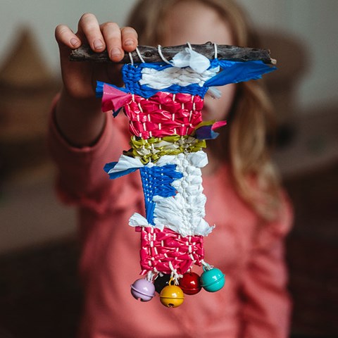 Weaving with plastic using a cardboard loom!